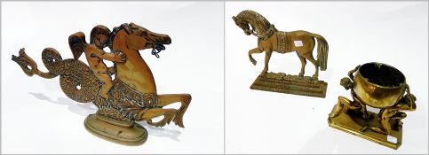 Two dimensional brass doorstop in the form of a cherub on seahorse, brass pot on stand supported