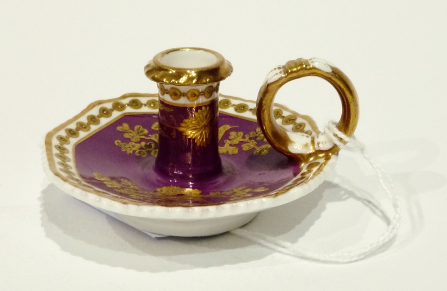 Early 19th century Spode chamberstick, with octagonal base, decorated with raised gilt birds and