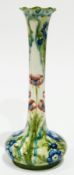 Early  Moorcroft Florian type vase with an oblate body and elongated neck, frilled everted rim,