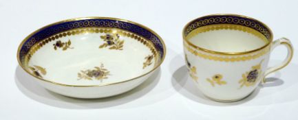 Late eighteenth-century (c. 1790) Caughley porcelain cup and saucer, gilt and royal blue painted