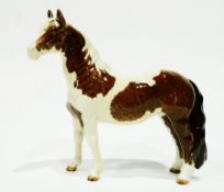 A Beswick Pinto pony, brown and cream glaze