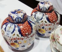 Pair 19th century continental porcelain covered ginger jars, ovoid, decorated in Japanese Imari