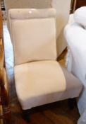 Nursing chair with scroll back, all in yellow ochre and cream brocade fabric