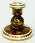 Early 19th century Spode chamberstick, with circular base, decorated with gilt exotic birds, foliage