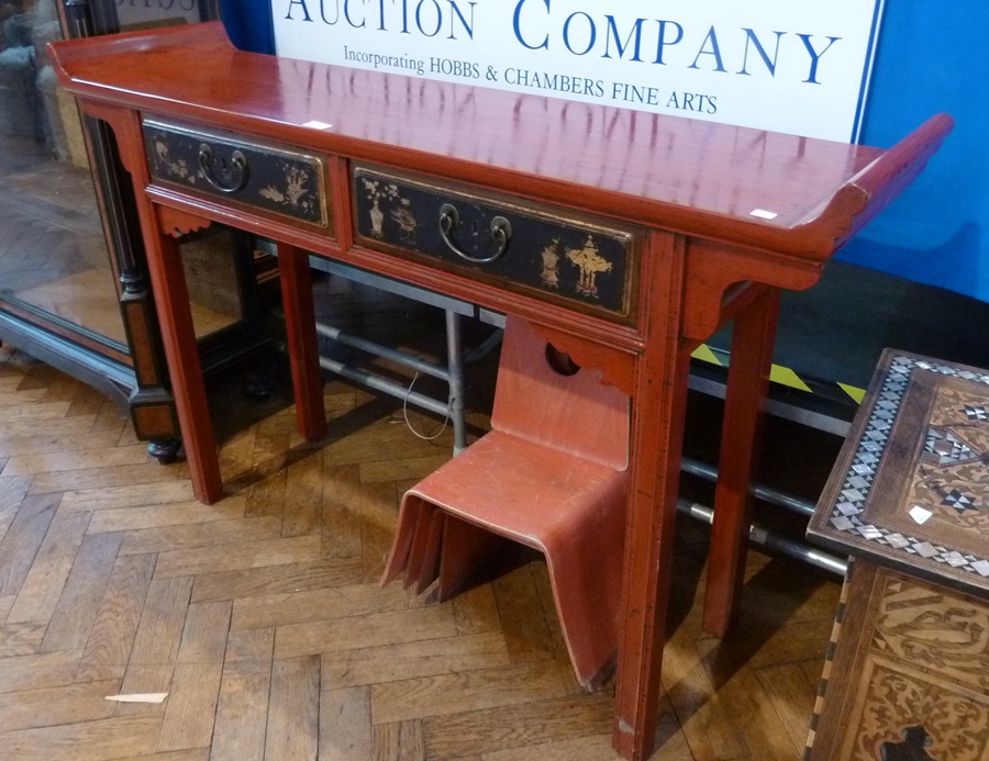 Chinese red lacquer table, with curved top, pair black lacquer frieze drawers with gilt decoration