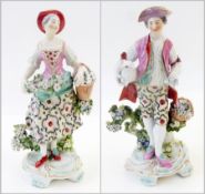 Pair eighteenth-century Derby figures of girl holding basket of eggs with flowers in her apron, pink