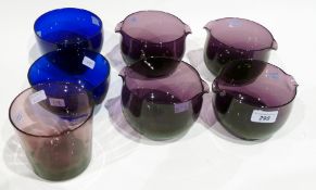 Four purple glass wine coolers, two blue glass finger bowls and a purple glass vase (7)