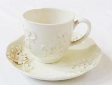 Eighteenth-century (c. 1750) 'blanc de chine' Bow porcelain cup and saucer, the cup with plain