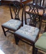 Pair Georgian mahogany dining chairs, pierced vase-shaped splat to tapestry drop-in seat, on