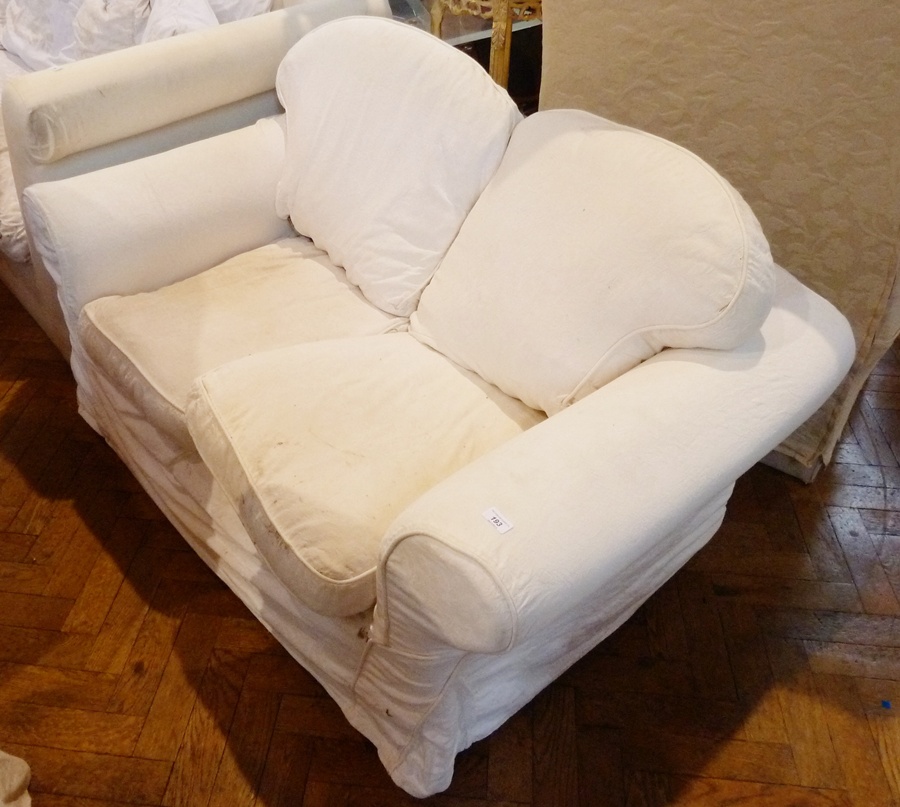 Modern cream two-seater settee