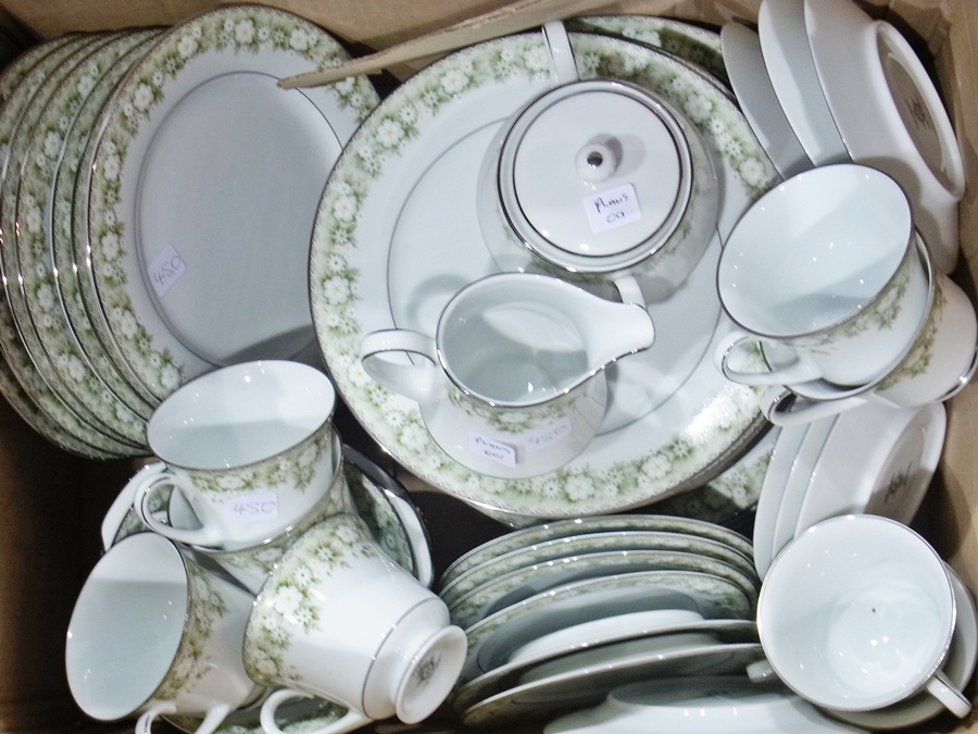 Noritake china tea and dinner service, "Princeton" pattern with green floral borders (1 box)