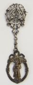 Continental white metal pierced foliate medallion brooch, with bolt ring suspension, and continental