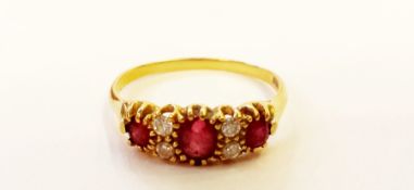18ct gold, ruby and diamond ring, set three rubies and four diamonds, all claw set