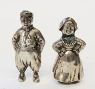 Pair German silver figure pepperettes, in the form of a man and woman in traditional costume, 7.