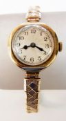 Lady's 1920's/30's 18ct gold wristwatch, circular dial, Arabic numerals, marked "R.W.C. Ltd", with