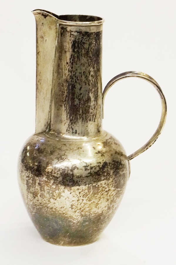 Art Deco style silver-coloured jug, possibly Norwegian, with bulbous base and tapered neck,