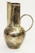 Art Deco style silver-coloured jug, possibly Norwegian, with bulbous base and tapered neck,