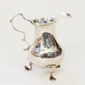 Georgian style cream jug, with scalloped edge and baluster form, on trefoil feet, 2oz approx.