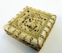 Chinese carved ivory puzzle, square form, with slide-out door to reveal assorted shapes, with relief