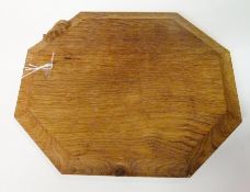 Mouseman oak cheeseboard, of octagonal form, with mouse to left-hand side, 29.5cm across