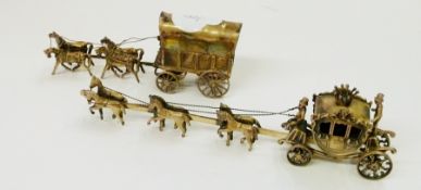 Dutch silver-coloured metal miniature model of a wagon with two figures and pulled by four horses,