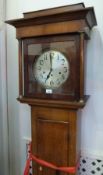 Late eighteenth/ Early nineteenth oak long case clock, with circular columns to hood, plain dial,