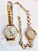 Two gold-coloured metal lady's wristwatches, both button winding, one with circular case and the