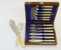 Set of silver plate fish servers, with bone handles and engraved decoration, with matching boxed set