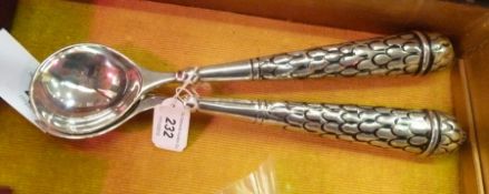 Pair silver plate salad servers, the handles stylised as pineapples, narrowing to the bowl and fork