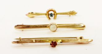 9ct gold bar brooch set single opal, another with horseshoe surmount, and another with pink single
