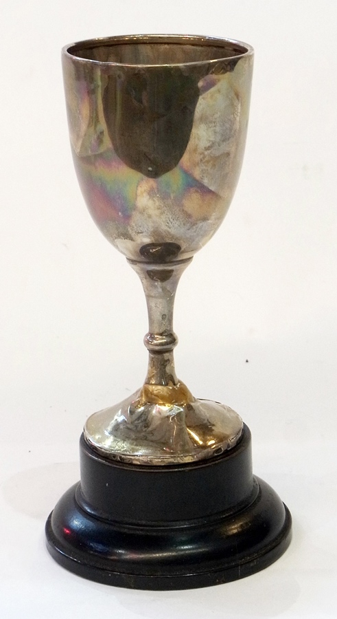 1920s trophy cup, on wooden circular plinth base, Birmingham, marks worn, un-monogramed, 3.5oz