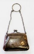 A 20th century silver purse with chain handle, with initials and engraved floral decoration, with