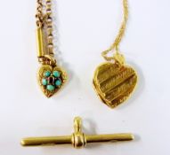 Small heart shaped pocket pendant in gold coloured metal set turquoise and garnet and gilt metal
