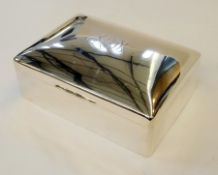 1920's silver mounted cigarette box, rectangular, the dome shaped hinged lid engraved with initials,