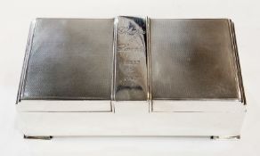 Silver mounted cigarette box of Art Deco style, rectangular and engine turned with stepped sides,