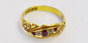 18ct gold, ruby and diamond ring, with three rubies and two diamonds in offset setting with scroll