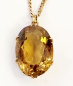 9ct gold and citrine coloured stone pendant, set with large oval cut stone on 9ct curblink chain