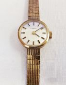 Lady's 9ct gold Tissot wristwatch, circular dial with baton numerals, button winding with 9ct gold