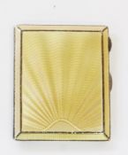 1930's enamel and silver cigarette case, the front decorated in yellow Deco style enamel with