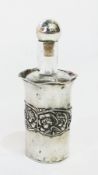 Edwardian silver cased glass scent bottle, outer case in silver decorated with cherubs and Art