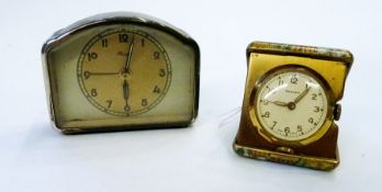 Newmark fold-out travel clock, in floral decorated case, and small mid-twentieth century alarm clock