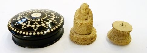 Circular decorated wooden trinket box, with bone circular decoration, and a carved simulated ivory