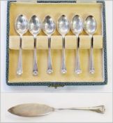 Set of six silver coffee spoons, with scallop-shell ends, Sheffield assay, cased and a silver butter
