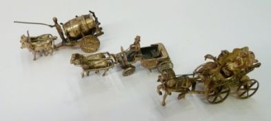 Dutch silver-coloured metal model of a Troika-type carriage, with two figures and pulled by a single