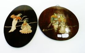 Two oriental carved and inlaid hardstone on wood plaques, one oval and one circular, decorated