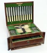 1920's oak canteen of cutlery, by Walker and Hall, with lift-up hinged lid to reveal plated
