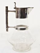 Victorian silver mounted glass claret jug in the manner of Dr. Christopher Dresser, the hinged