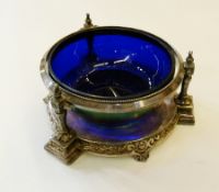 Sweetmeat dish, of blue iridescent glass, set within a silver plated stand, supported by three