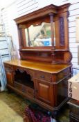 Large Edwardian walnut mirrorback sideboard, with flat moulded breakfront cornice, the canopy having