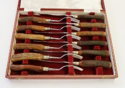 Cased set of steak knives and forks, with horn handles, made by Joseph Rogers & Sons Ltd.,